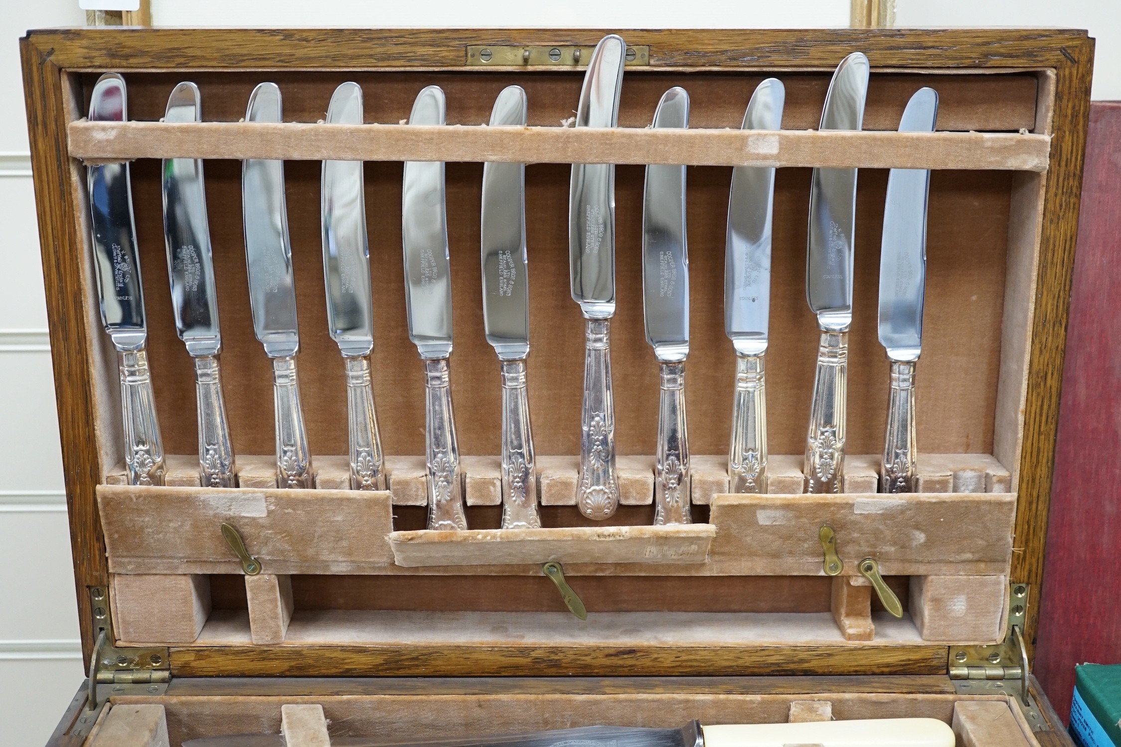 A mid 20th century canteen of Kings pattern plated flatware